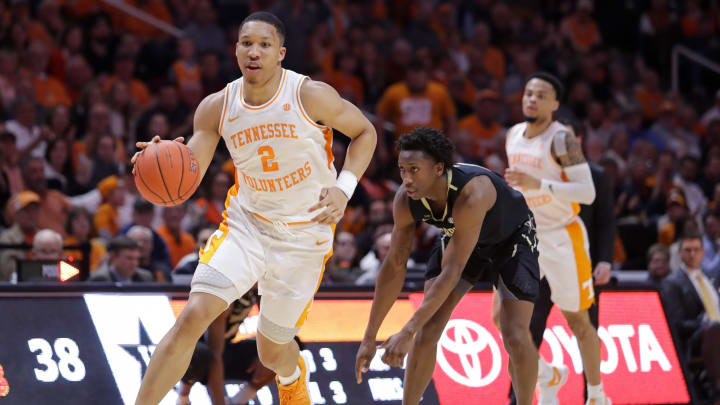 KNOXVILLE, TN – FEBRUARY 19: Grant Williams #2 of the Tennessee Volunteers dribbles past Saben Lee #0 of the Vanderbilt Commodores during their game at Thompson-Boling Arena on February 19, 2019 in Knoxville, Tennessee. Tennessee won the game 58-46. (Photo by Donald Page/Getty Images)