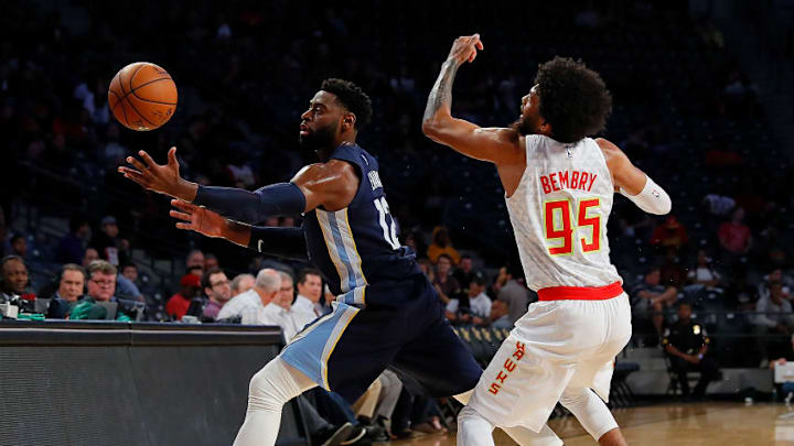 ATLANTA, GA - OCTOBER 09: Tyreke Evans #12 of the Memphis Grizzlies has the ball knocked out away by DeAndre' Bembry #95 of the Atlanta Hawks at McCamish Pavilion on October 9, 2017 in Atlanta, Georgia. NOTE TO USER: User expressly acknowledges and agrees that, by downloading and or using this photograph, User is consenting to the terms and conditions of the Getty Images License Agreement. (Photo by Kevin C. Cox/Getty Images)