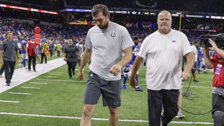 INDIANAPOLIS, IN - AUGUST 24: Andrew Luck #12 of the Indianapolis Colts walks off the field following reports of his retirement from the NFL after the preseason game against the Chicago Bears at Lucas Oil Stadium on August 24, 2019 in Indianapolis, Indiana. (Photo by Michael Hickey/Getty Images)