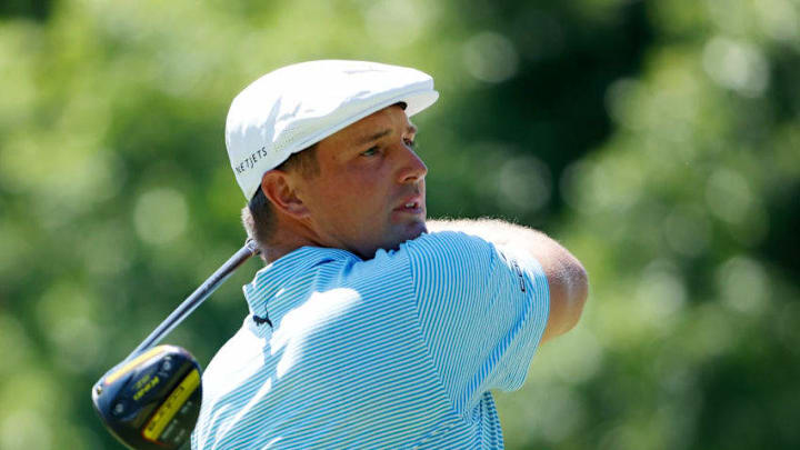 FORT WORTH, TEXAS - JUNE 14: Bryson DeChambeau of the United States plays his shot from the 18th tee during the final round of the Charles Schwab Challenge on June 14, 2020 at Colonial Country Club in Fort Worth, Texas. (Photo by Tom Pennington/Getty Images)