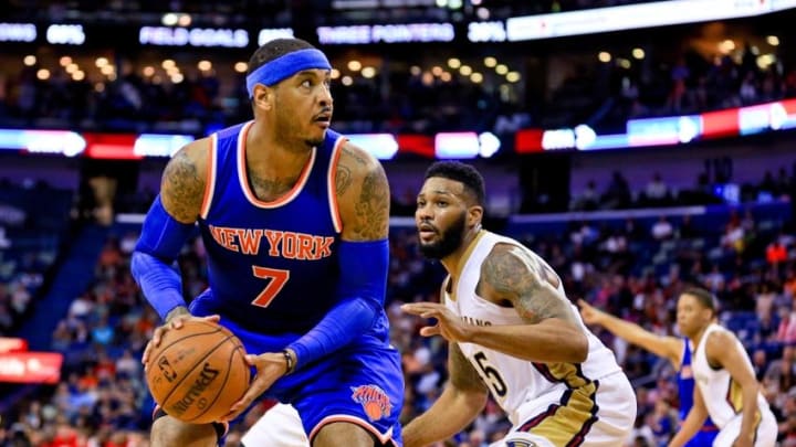 Mar 28, 2016; New Orleans, LA, USA; New York Knicks forward Carmelo Anthony (7) is defended by New Orleans Pelicans forward Alonzo Gee (15) during the second quarter of a game at the Smoothie King Center. Mandatory Credit: Derick E. Hingle-USA TODAY Sports