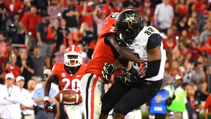 ATHENS, GA - OCTOBER 6: Richard LeCounte #2 of the Georgia Bulldogs defends a pass against Jared Pinkney #80 of the Vanderbilt Commodores on October 6, 2018 at Sanford Stadium in Athens, Georgia. (Photo by Scott Cunningham/Getty Images)
