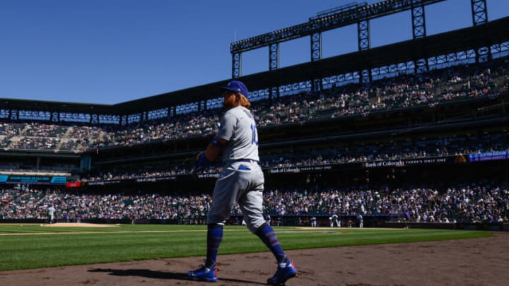 DENVER, CO - APRIL 1: Justin Turner #10 of the Los Angeles Dodgers walks on the field during the second inning against the Colorado Rockies on Opening Day at Coors Field on April 1, 2021 in Denver, Colorado. (Photo by Justin Edmonds/Getty Images)