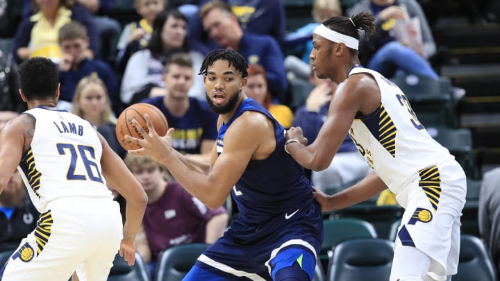 INDIANAPOLIS, INDIANA – OCTOBER 15: Karl-Anthony Towns #32 of the Minnesota Timberwolves looks to pass the ball against the Indiana Pacers at Bankers Life Fieldhouse on October 15, 2019 in Indianapolis, Indiana. (Photo by Andy Lyons/Getty Images)