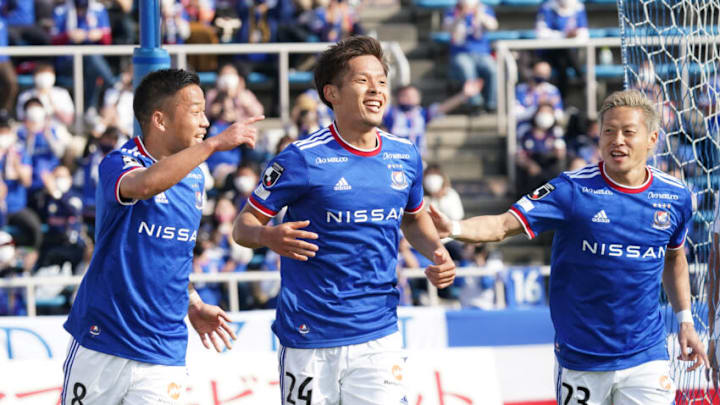 YOKOHAMA, JAPAN - MARCH 27: Tomoki Iwata (C) of Yokohama F.Marinos celebrates scoring his side's third goal during the J.League YBC Levain Cup Group D match between Yokohama F.Marinos and Sanfrecce Hiroshima at the NHK Spring Mitsuzawa Football Stadium on March 27, 2021 in Yokohama, Kanagawa, Japan. (Photo by Etsuo Hara/Getty Images) YOKOHAMA, JAPAN - MARCH 27: Tomoki Iwata (C) of Yokohama F.Marinos celebrates scoring his side's third goal during the J.League YBC Levain Cup Group D match between Yokohama F.Marinos and Sanfrecce Hiroshima at the NHK Spring Mitsuzawa Football Stadium on March 27, 2021 in Yokohama, Kanagawa, Japan. (Photo by Etsuo Hara/Getty Images)