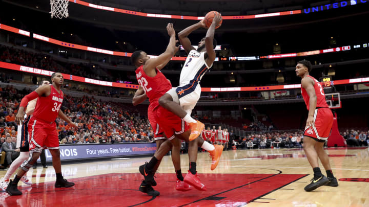 Illinois Fighting Illini forward Kipper Nichols (2) fouls Ohio State Buckeyes guard Keyshawn Woods (32) during the second half at the United Center Wednesday Dec. 5, 2018, in Chicago. (Armando L. Sanchez/Chicago Tribune/TNS via Getty Images)