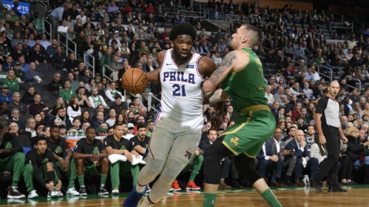 BOSTON, MA - DECEMBER 12: Joel Embiid #21 of the Philadelphia 76ers drives to the basket against the Boston Celtics on December 12, 2019 at the TD Garden in Boston, Massachusetts. NOTE TO USER: User expressly acknowledges and agrees that, by downloading and or using this photograph, User is consenting to the terms and conditions of the Getty Images License Agreement. Mandatory Copyright Notice: Copyright 2019 NBAE (Photo by Brian Babineau/NBAE via Getty Images)