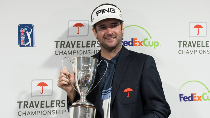 Jun 24, 2018; Cromwell, CT, USA; Bubba Watson holds the championship trophy after winning the Travelers Championship at TPC River Highlands. Mandatory Credit: Bill Streicher-USA TODAY Sports