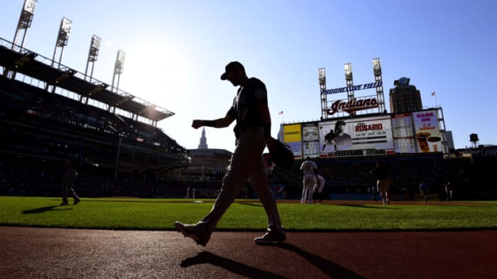 CLEVELAND, OHIO - JUNE 12: Mitch Haniger #17 of the Seattle Mariners walks off the field at the end of the sixth inning during their game against the Cleveland Indians at Progressive Field on June 12, 2021 in Cleveland, Ohio. (Photo by Emilee Chinn/Getty Images)