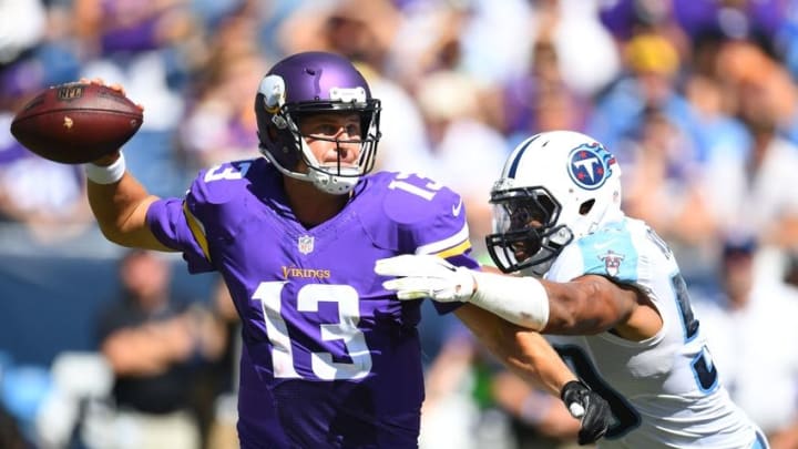 Sep 11, 2016; Nashville, TN, USA; Minnesota Vikings quarterback Shaun Hill (13) passes the ball with defensive pressure from Tennessee Titans linebacker Wesley Woodyard (59) during the second half at Nissan Stadium. Mandatory Credit: Christopher Hanewinckel-USA TODAY Sports