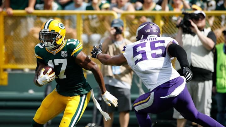 GREEN BAY, WI - SEPTEMBER 16: Davante Adams #17 of the Green Bay Packers runs past Anthony Barr #55 of the Minnesota Vikings to score a touchdown during the second quarter of a game at Lambeau Field on September 16, 2018 in Green Bay, Wisconsin. (Photo by Joe Robbins/Getty Images)
