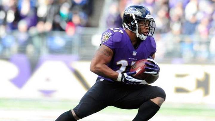 Nov 24, 2013; Baltimore, MD, USA; Baltimore Ravens running back Ray Rice (27) runs with the ball during the game against the New York Jets at M&T Bank Stadium. Mandatory Credit: Evan Habeeb-USA TODAY Sports