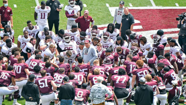 STARKVILLE, MISSISSIPPI - APRIL 17: head coach Mike Leach of the Mississippi State Bulldogs talks with his players during the Maroon and White spring at Davis Wade Stadium on April 17, 2021 in Starkville, Mississippi. (Photo by Justin Ford/Getty Images)