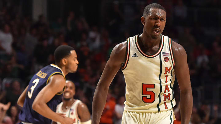 Jan 12, 2017; Coral Gables, FL, USA; Miami Hurricanes guard Davon Reed (5) reacts after making a basket against the Notre Dame Fighting Irish during the second half at Watsco Center. The Notre Dame Fighting Irish defeat the Miami Hurricanes 67-62. Mandatory Credit: Jasen Vinlove-USA TODAY Sports