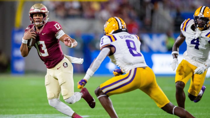 Florida State Seminoles quarterback Jordan Travis (13) looks towards the end zone as he runs the ball on Sunday, Sept. 3, 2023.