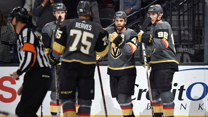LAS VEGAS, NV - MARCH 20: Pierre-Edouard Bellemare #41 celebrates his goal with teammates Brayden McNabb #3, Ryan Reaves #75, and Tomas Nosek #92 of the Vegas Golden Knights against the Vancouver Canucks during the game at T-Mobile Arena on March 20, 2018 in Las Vegas, Nevada. (Photo by David Becker/NHLI via Getty Images)