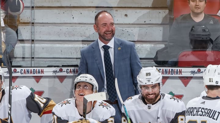 OTTAWA, ON – JANUARY 16: Head coach Peter DeBoer of the Vegas Golden Knights shares a laugh with Cody Eakin #21 and Alex Tuch #89 at the bench before an NHL game against the Ottawa Senators at Canadian Tire Centre on January 16, 2020 in Ottawa, Ontario, Canada. (Photo by Andre Ringuette/NHLI via Getty Images)