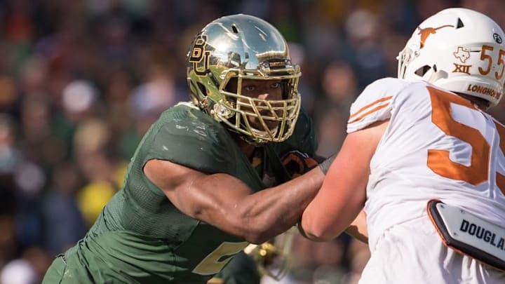 Dec 5, 2015; Waco, TX, USA; Texas Longhorns offensive lineman Connor Williams (55) blocks Baylor Bears defensive end Shawn Oakman (2) at McLane Stadium. The Longhorns defeat the Bears 23-17. Mandatory Credit: Jerome Miron-USA TODAY Sports