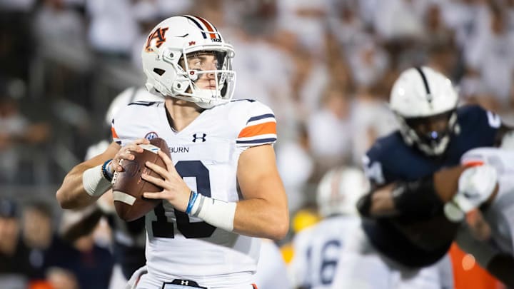 Auburn quarterback Bo Nix pump fakes before throwing the ball in the second quarter against Penn State at Beaver Stadium on Saturday, Sept. 18, 2021, in State College.Hes Dr 091821 Pennstate 28