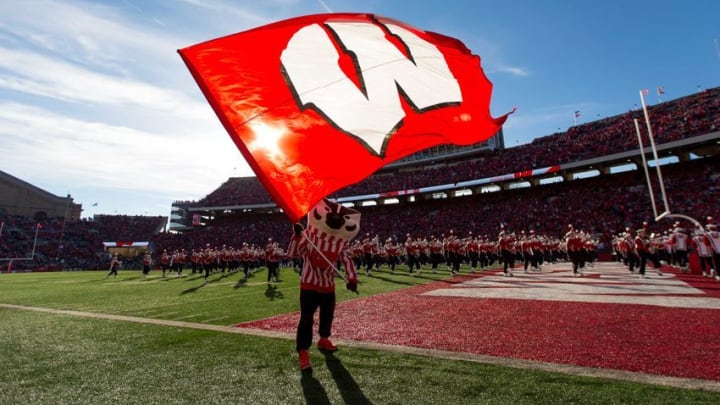 Nov 12, 2016; Madison, WI, USA; Wisconsin Badgers mascot Bucky Badger waves the Wisconsin flag prior to the game against the Illinois Fighting Illini at Camp Randall Stadium. Wisconsin won 48-3. Mandatory Credit: Jeff Hanisch-USA TODAY Sports