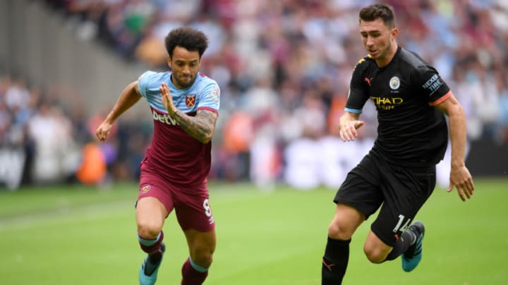 LONDON, ENGLAND - AUGUST 10: Felipe Anderson of West Ham United battles for possession with Aymeric Laporte of Manchester City during the Premier League match between West Ham United and Manchester City at London Stadium on August 10, 2019 in London, United Kingdom. (Photo by Laurence Griffiths/Getty Images)