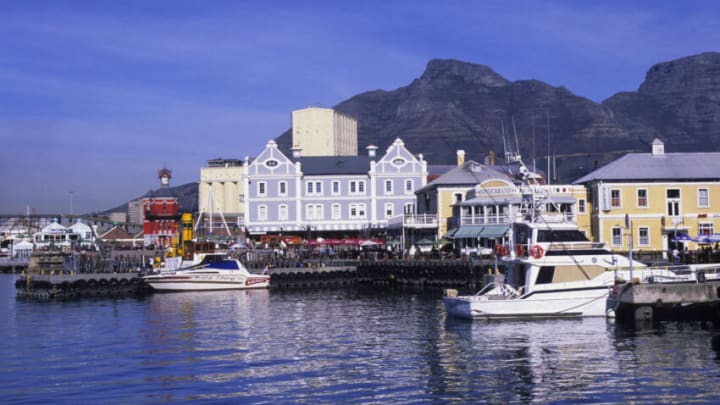 SOUTH AFRICA - 1998/01/01: South Africa, Cape Town, Waterfront Center, Table Mountain In Background. (Photo by Wolfgang Kaehler/LightRocket via Getty Images)