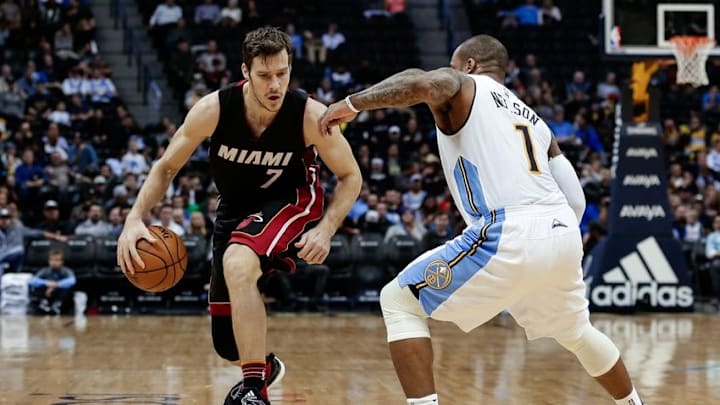 Nov 30, 2016; Denver, CO, USA; Denver Nuggets guard Jameer Nelson (1) guards Miami Heat guard Goran Dragic (7) in the third quarter at the Pepsi Center. The Heat won 106-98. Mandatory Credit: Isaiah J. Downing-USA TODAY Sports