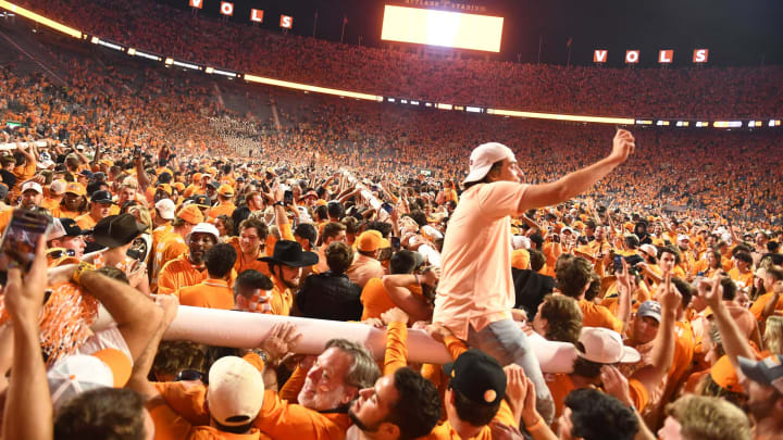 Fans move the goal post across the field after Tennessee’s 52-49 win over Alabama.Syndication The Knoxville News Sentinel