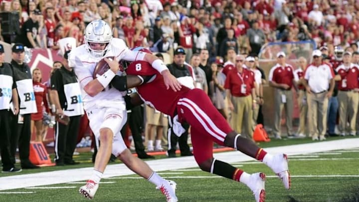 Oct 29, 2016; Bloomington, IN, USA; Maryland Terrapins quarterback Perry Hills (11) carries the ball as Indiana Hoosiers linebacker Tegray Scales (8) defends during the second half of the game at Memorial Stadium. The Hoosiers won 42 to 36. Mandatory Credit: Marc Lebryk-USA TODAY Sports