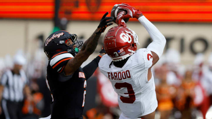 Nov 4, 2023; Stillwater, Oklahoma, USA; Oklahoma Sooners wide receiver Jalil Farooq (3) can't hang on to the ball beside Oklahoma State Cowboys cornerback Korie Black (2) during a Bedlam college football game between the Oklahoma State University Cowboys (OSU) and the University of Oklahoma Sooners (OU) at Boone Pickens Stadium. Mandatory Credit: Bryan Terry-USA TODAY Sports