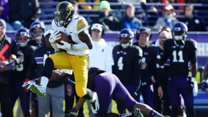 Iowa Hawkeyes defensive back Desmond King (14) intercepts a pass. Mandatory Credit: Jerry Lai-USA TODAY Sports