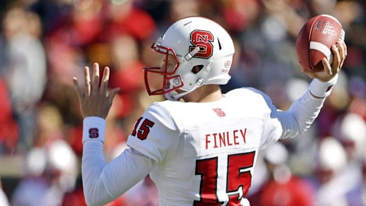 Oct 22, 2016; Louisville, KY, USA; North Carolina State Wolfpack quarterback Ryan Finley (15) looks to pass against the Louisville Cardinals during the second quarter at Papa John