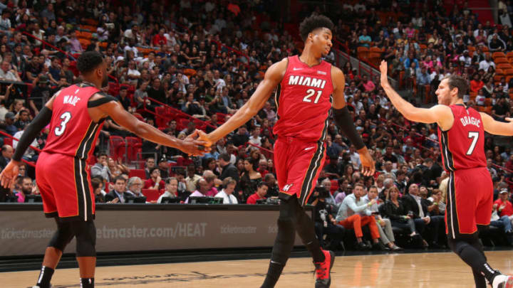 MIAMI, FL - MARCH 8: Dwyane Wade #3 and Hassan Whiteside #21 of the Miami Heat high five during the game against the Cleveland Cavaliers on March 8, 2019 at American Airlines Arena in Miami, Florida. NOTE TO USER: User expressly acknowledges and agrees that, by downloading and/or using this photograph, user is consenting to the terms and conditions of the Getty Images License Agreement. Mandatory Copyright Notice: Copyright 2019 NBAE (Photo by Issac Baldizon/NBAE via Getty Images)