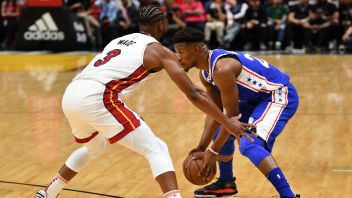 MIAMI, FL - APRIL 09: Dwyane Wade #3 of the Miami Heat in action against Jimmy Butler #23 of the Philadelphia 76ers during the final regular season home game of his career at American Airlines Arena on April 09, 2019 in Miami, Florida. NOTE TO USER: User expressly acknowledges and agrees that, by downloading and or using this photograph, User is consenting to the terms and conditions of the Getty Images License Agreement. (Photo by Mark Brown/Getty Images)