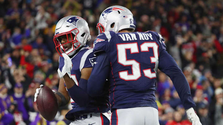 FOXBOROUGH, MA - DECEMBER 02: Duron Harmon #21 of the New England Patriots celebrates after intercepting a pass in the end zone during the fourth quarter against the Minnesota Vikings at Gillette Stadium on December 2, 2018 in Foxborough, Massachusetts. (Photo by Adam Glanzman/Getty Images)