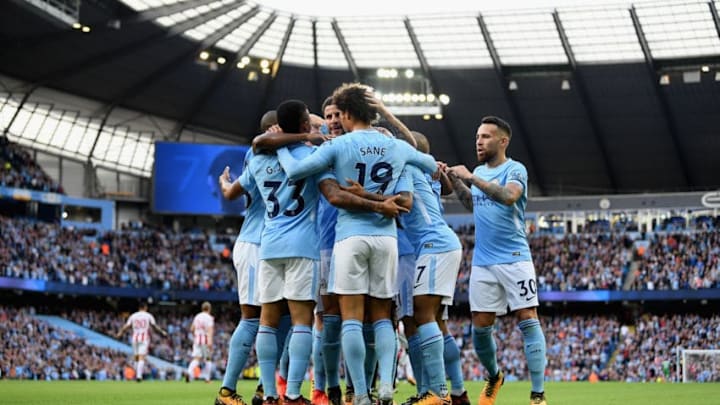 MANCHESTER, ENGLAND - OCTOBER 14: Raheem Sterling of Manchester City celebrates scoring his sides second goal with Gabriel Jesus of Manchester City and his team mates during the Premier League match between Manchester City and Stoke City at Etihad Stadium on October 14, 2017 in Manchester, England. (Photo by Laurence Griffiths/Getty Images)