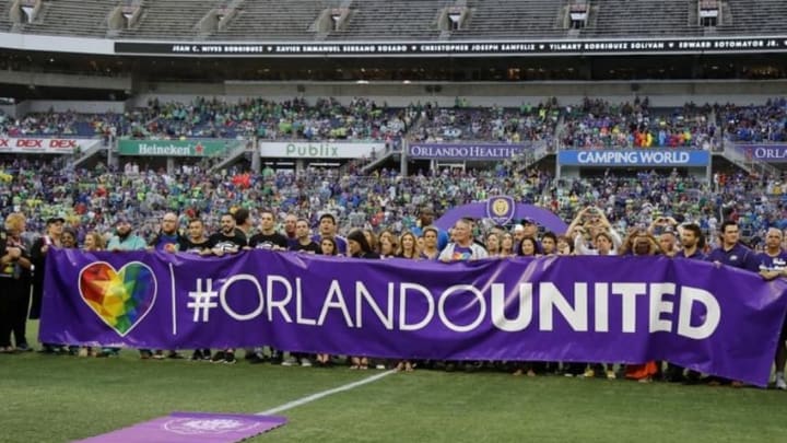 Jun 18, 2016; Orlando, FL, USA; Owners of Pulse night club, first responders, medical personal, volunteers come together to stand Orlando United before the game between the Orlando City SC and San Jose Earthquakes at Camping World Stadium. Mandatory Credit: Kim Klement-USA TODAY Sports