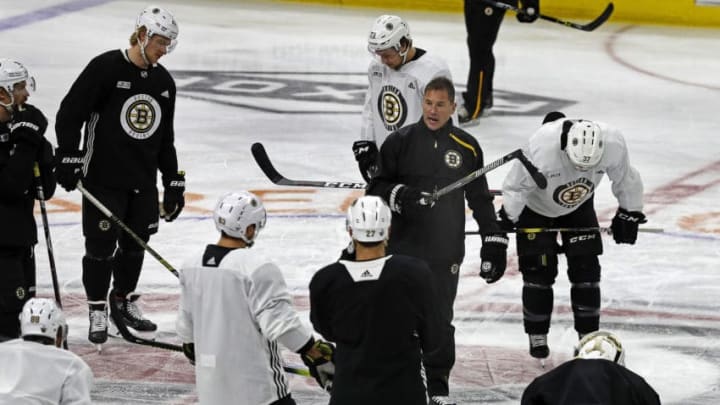 RALEIGH, NC - MAY 15: Boston Bruins head coach Bruce Cassidy instructs his players during a practice session in preparation for Game 4 of the NHL Stanley Cup Eastern Conference Finals at PNC Arena in Raleigh, NC on May 15, 2019. (Photo by Jim Davis/The Boston Globe via Getty Images)