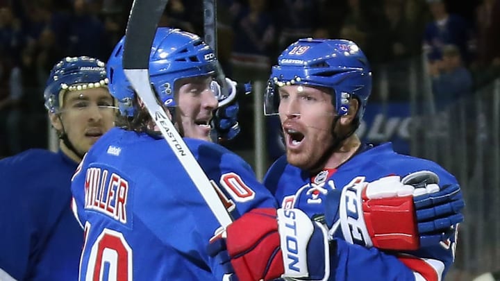 NEW YORK, NY – APRIL 27: Brad Richards #19 of the New York Rangers (R) celebrates his second period goal along with J.T. Miller #10 (L) against the Philadelphia Flyers in Game Five of the First Round of the 2014 NHL Stanley Cup Playoffs at Madison Square Garden on April 27, 2014 in New York City. (Photo by Bruce Bennett/Getty Images)