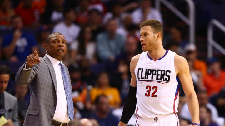 Mar 30, 2017; Phoenix, AZ, USA; Los Angeles Clippers head coach Doc Rivers talks with forward Blake Griffin against the Phoenix Suns at Talking Stick Resort Arena. The Clippers defeated the Suns 124-118. Mandatory Credit: Mark J. Rebilas-USA TODAY Sports