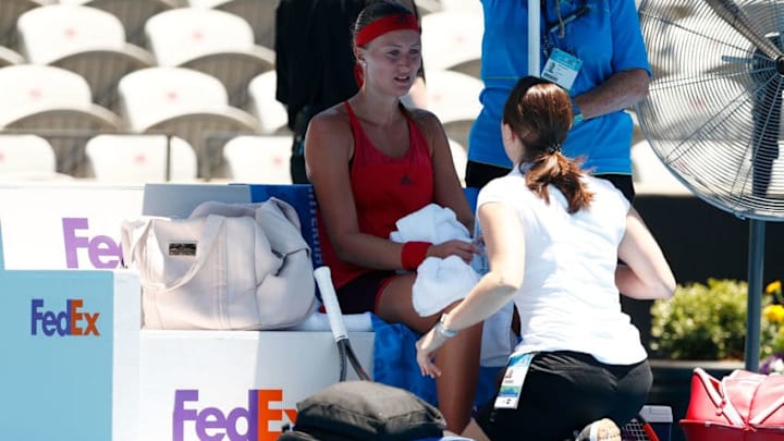 SYDNEY, AUSTRALIA - JANUARY 07: Kristina Mladenovic of France retires injured in her first round match against Ellen Perez of Australia during day one of the 2018 Sydney International at Sydney Olympic Park Tennis Centre on January 7, 2018 in Sydney, Australia. (Photo by Zak Kaczmarek/Getty Images)