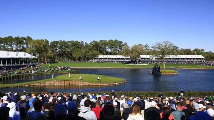 PONTE VEDRA BEACH, FLORIDA - MARCH 12: A general view of the 17th green is seen as fans look on during the second round of THE PLAYERS Championship on the Stadium Course at TPC Sawgrass on March 12, 2022 in Ponte Vedra Beach, Florida. (Photo by Mike Ehrmann/Getty Images)