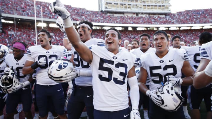 MADISON, WI - SEPTEMBER 15: Isaiah Kaufusi #53 of the BYU Cougars celebrates with teammates after the game against the Wisconsin Badgers at Camp Randall Stadium on September 15, 2018 in Madison, Wisconsin. BYU won 24-21. (Photo by Joe Robbins/Getty Images)