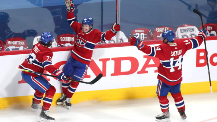 Jun 18, 2021; Montreal, Quebec, CAN; Montreal Canadiens Cole Caufield Tyler Toffoli and Nick Suzuki Mandatory Credit: Jean-Yves Ahern-USA TODAY Sports