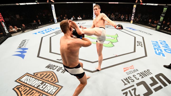STOCKHOLM, SWEDEN - MAY 28: (R-L) Darren Till kicks Jessin Ayari in their welterweight fight during the UFC Fight Night event at the Ericsson Globe Arena on May 28, 2017 in Stockholm, Sweden. (Photo by Jeff Bottari/Zuffa LLC/Zuffa LLC via Getty Images)