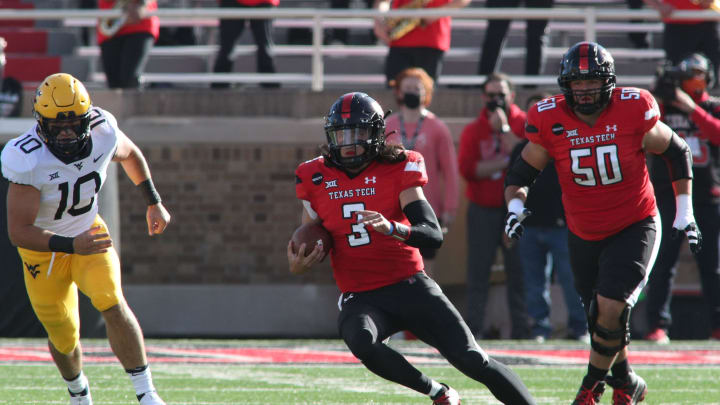 Oct 24, 2020; Lubbock, Texas, USA; Texas Tech Red Raiders quarterback Henry Colombi (3) rushes against the West Virginia Mountaineers in the first half at Jones AT&T Stadium. Mandatory Credit: Michael C. Johnson-USA TODAY Sports