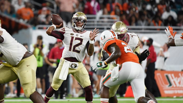 Oct 8, 2016; Miami Gardens, FL, USA; Florida State Seminoles quarterback Deondre Francois (12) throws a pass during the first half against the Miami Hurricanes during the first half at Hard Rock Stadium. Mandatory Credit: Steve Mitchell-USA TODAY Sports