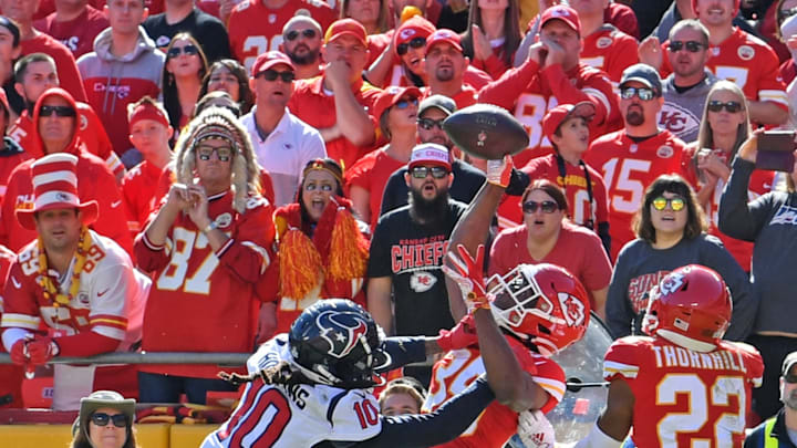 KANSAS CITY, MO – OCTOBER 13: Cornerback Charvarius Ward #35 of the Kansas City Chiefs intercepts a pass against wide receiver DeAndre Hopkins #10 of the Houston Texans during the second half at Arrowhead Stadium on October 13, 2019 in Kansas City, Missouri. (Photo by Peter Aiken/Getty Images)