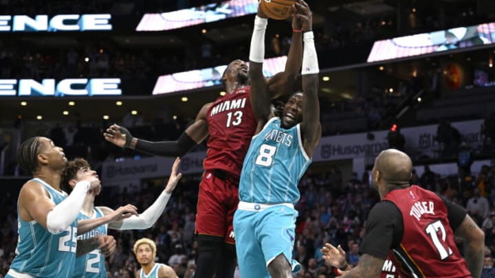 Montrezl Harrell #6 of the Charlotte Hornets battles Bam Adebayo #13 of the Miami Heat for a rebound(Photo by Grant Halverson/Getty Images)