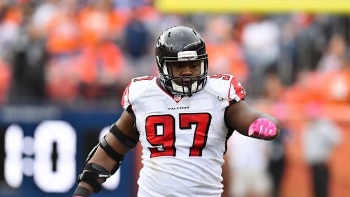 Oct 9, 2016; Denver, CO, USA; Atlanta Falcons defensive tackle Grady Jarrett (97) celebrates his sack of Denver Broncos quarterback Paxton Lynch (12) (not pictured) in the second half at Sports Authority Field at Mile High. The Falcons defeated the Broncos 23-16. Mandatory Credit: Ron Chenoy-USA TODAY Sports
